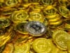https://www.vecteezy.com/photo/7261934-golden-bitcoin-cryptocurrency-on-pile-gold-coins-a-lot-of