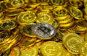https://www.vecteezy.com/photo/7261934-golden-bitcoin-cryptocurrency-on-pile-gold-coins-a-lot-of