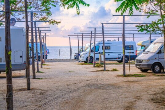 https://www.vecteezy.com/photo/6249891-mobile-homes-caravans-at-vehicle-camping-near-sandy-beach-of-tyrrhenian-sea-in-tropea-town
