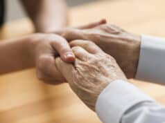 https://www.vecteezy.com/photo/2327829-nurse-holding-senior-mans-hands-with-empathy