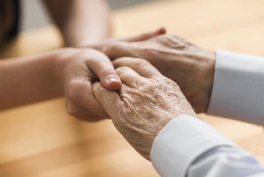https://www.vecteezy.com/photo/2327829-nurse-holding-senior-mans-hands-with-empathy