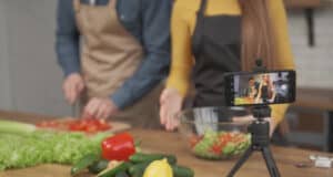https://www.vecteezy.com/photo/3132951-young-couple-cooking-together-and-recording-video-food-blog-on-camera-in-the-kitchen-at-home-focus-on-phone-screen