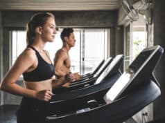 https://www.vecteezy.com/photo/3522748-young-couple-exercising-by-running-on-the-treadmill