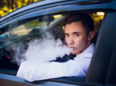 https://www.freepik.com/premium-photo/view-from-side-young-man-smoking-e-cigarette-as-he-drives-his-car-urban-street-car-driver-peeps-out-car-smokes_7679269.htm#page=2&query=driver%20smoking&position=16&from_view=search