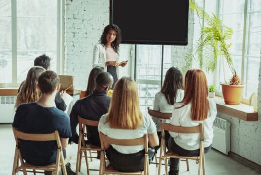 https://www.freepik.com/free-photo/female-african-american-speaker-giving-presentation-hall-university-workshop_7354504.htm#query=business%20coach&position=22&from_view=search
