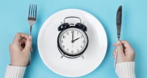https://www.freepik.com/premium-photo/hands-holding-knife-fork-alarm-clock-white-plate_13641779.htm#query=intermittent%20fasting&position=23&from_view=search