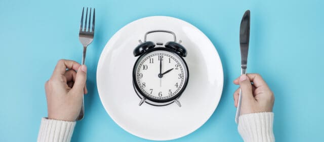 https://www.freepik.com/premium-photo/hands-holding-knife-fork-alarm-clock-white-plate_13641779.htm#query=intermittent%20fasting&position=23&from_view=search