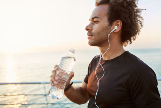 https://www.freepik.com/free-photo/outdoor-shot-stylish-dark-skinned-male-athlete-drinking-water-out-plastic-bottle-after-cardio-workout-runner-hydrating-during-training-by-sea-morning-sunlight_9696864.htm#query=hydration&position=45&from_view=search