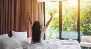 https://www.freepik.com/premium-photo/rear-view-woman-stretching-after-waking-up-morning-looking-beautiful-nature-view-outside-bedroom-window_8648560.htm#query=waking%20up&position=47&from_view=search