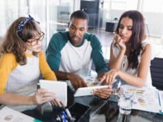 https://www.vecteezy.com/photo/1177911-creative-business-people-discussing-over-digital-tablets-at-office
