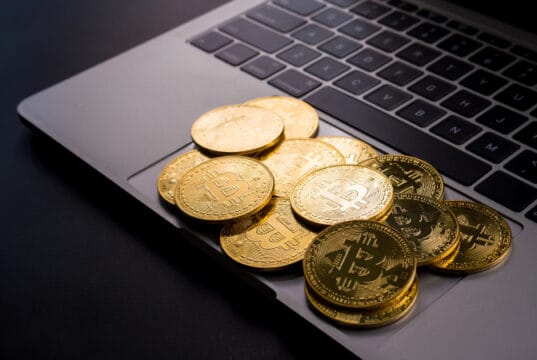 https://www.vecteezy.com/photo/9332208-golden-coins-with-bitcoin-symbol-on-computer