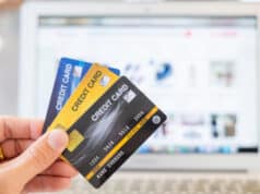 https://www.vecteezy.com/photo/2077569-hands-holding-a-credit-card-and-using-a-laptop-online-shopping-concept
