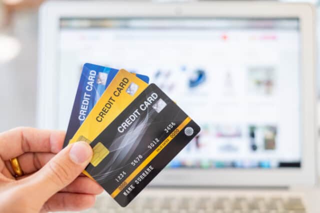 https://www.vecteezy.com/photo/2077569-hands-holding-a-credit-card-and-using-a-laptop-online-shopping-concept