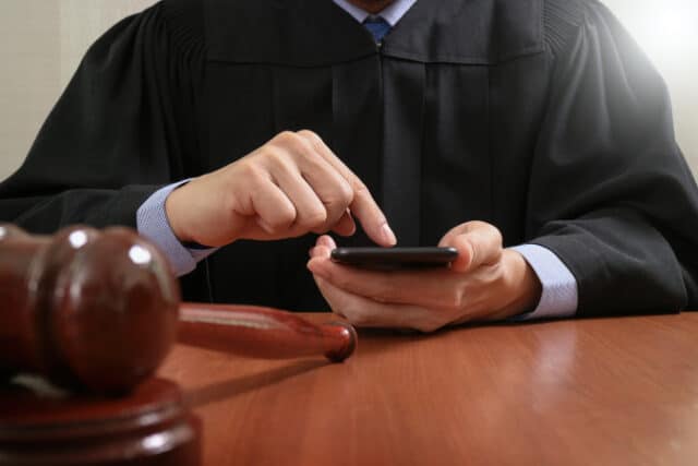 vecteezy_justice-and-law-concept-male-judge-in-a-courtroom-with-the__391 https://www.vecteezy.com/photo/5319938-justice-and-law-concept-male-judge-in-a-courtroom-with-the-gavel-working-with-smart-phone-computer-on-wood-table