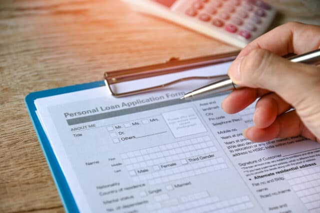 https://www.vecteezy.com/photo/8369308-personal-loan-concept-with-loan-application-form-paper-with-calculator-and-business-manholding-a-penclient-signs-loan-on-the-table-loan-business-finance-economy-commercial-real-estate-investments