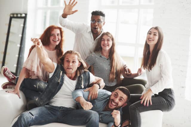 https://www.vecteezy.com/photo/4259363-posing-for-the-picture-office-friends-have-cheerful-time-sitting-and-laying-on-the-white-sofa