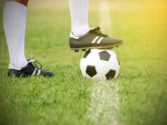 https://www.vecteezy.com/photo/1226613-soccer-player-standing-with-ball-on-the-field
