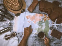 https://www.vecteezy.com/photo/8006056-tourist-planning-vacation-with-the-help-of-world-map-and-compass-along-and-coffee-cup-with-coffee-grinder-with-other-travel-accessories-preparing-for-travel-travel-planning-concept-holiday-with-map