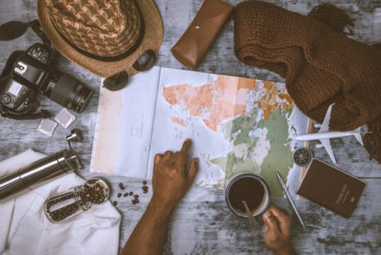 https://www.vecteezy.com/photo/8006056-tourist-planning-vacation-with-the-help-of-world-map-and-compass-along-and-coffee-cup-with-coffee-grinder-with-other-travel-accessories-preparing-for-travel-travel-planning-concept-holiday-with-map