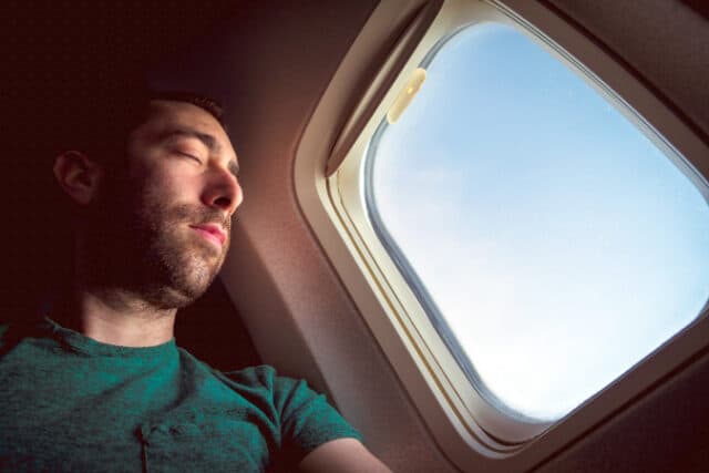 https://www.vecteezy.com/photo/3690615-young-man-resting-and-sleeping-on-an-airplane