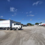 Produce trucks uploading, Jamerson Farms