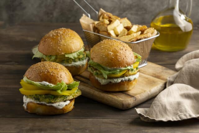 arrangement-with-delicious-vegan-burger https://www.freepik.com/free-photo/arrangement-with-delicious-vegan-burger_16392884.htm#page=2&query=plant%20based%20food&position=29&from_view=search