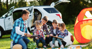 https://www.freepik.com/premium-photo/family-spending-time-together-father-reading-book-outdoor-with-kids-against-their-suv-car_30594961.htm#query=dad%20reads%20kids&position=7&from_view=search
