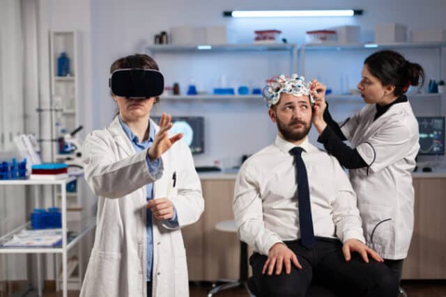 https://www.freepik.com/free-photo/physician-doctor-with-virtual-reality-headset-while-neurologist-woman-adjusting-eeg-scanner-man-patient-analyzing-brain-evolution-during-neurology-experiment-scientist-engineer-using-high-tech_20936727.htm#query=high%20tech%20doctor&position=21&from_view=search