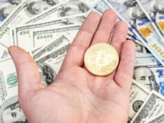 https://www.freepik.com/premium-photo/man-s-hand-holding-golden-bitcoin-background-us-dollars_29643450.htm#page=2&query=bitcoin&position=12&from_view=search