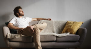 https://www.freepik.com/free-photo/picture-stylish-handsome-young-guy-with-fuzzy-beard-voluminous-hairdo-bare-feet-keeping-eyes-closed-falling-asleep-listening-classical-music-enjoying-leisure-time-sitting-couch_11035948.htm#query=sitting&position=45&from_view=search