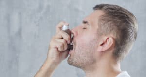 https://www.freepik.com/free-photo/portrait-young-man-using-asthma-inhaler-against-grey-background_3590155.htm#query=asthma&position=2&from_view=search