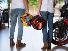 https://www.vecteezy.com/photo/1978913-couple-holding-motorcycle-helmets