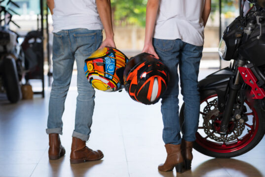 https://www.vecteezy.com/photo/1978913-couple-holding-motorcycle-helmets
