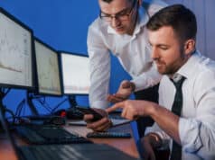 https://www.vecteezy.com/photo/8220274-different-information-on-screens-two-stock-traders-working-in-the-office-with-exchange-technology