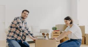 https://www.vecteezy.com/photo/8827821-positive-millennial-couple-play-with-favourite-pet-have-fun-during-moving-in-new-apartment-stand-on-knees-near-carton-box-with-dog-enjoy-domestic-atmosphere-live-together-in-modern-house