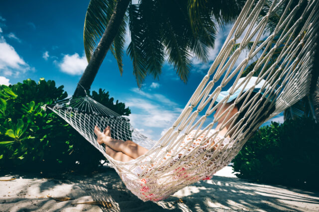 vecteezy_woman-relaxing-in-the-shade-of-palms-on-a-hammock_10275152_913 https://www.vecteezy.com/photo/10275152-woman-relaxing-in-the-shade-of-palms-on-a-hammock
