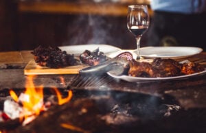 Ditch the Heavy Cabernets and Grab Your Tongs: The Ultimate Wine Guide for Summer Grilling https://www.freepik.com/free-photo/closeup-shot-barbequed-meat-glass-wine-near-fireplace_28363322.htm#query=bbq%20and%20wine&position=10&from_view=search