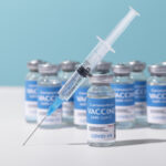 coronavirus-arrangement-with-vaccine-bottle-syringe