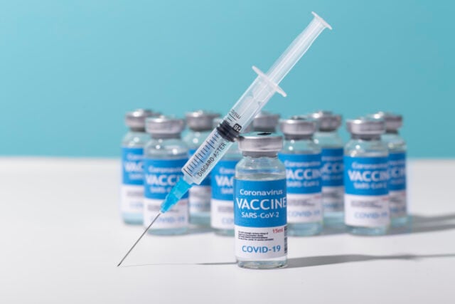coronavirus-arrangement-with-vaccine-bottle-syringe https://www.freepik.com/free-photo/coronavirus-arrangement-with-vaccine-bottle-syringe_18684004.htm#query=syringe%20covid%20vaccine&position=24&from_view=search