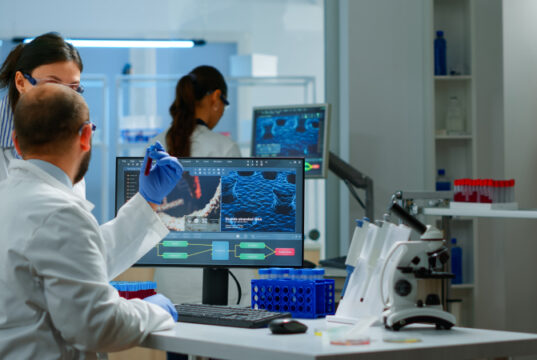 https://www.freepik.com/premium-photo/group-scientists-working-modern-equipped-laboratory-pointing-computer-desktop-team-doctors-examining-vaccine-evolution-using-high-tech-researching-diagnosis-against-covid19-virus_17763102.htm?query=drug%20lab