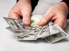 https://www.freepik.com/premium-photo/man-holding-dollars-his-hands-man-counts-money_13693965.htm#query=cash&position=14&from_view=search