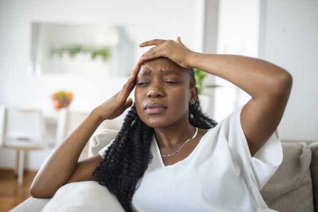 https://www.freepik.com/free-photo/portrait-young-black-girl-sitting-couch-home-with-headache-pain-beautiful-woman-suffering-from-chronic-daily-headaches-sad-woman-holding-her-head-because-sinus-pain_27156398.htm#query=migraine&position=23&from_view=search