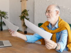 https://www.freepik.com/free-photo/sad-male-engineer-his-sixties-wearing-formal-clothes-spectacles-sitting-wooden-desk-with-generic-laptop-holding-documents-his-hands-being-frustrated-job-occupation-stress-concept_11697217.htm#query=psying%20bills&position=7&from_view=search&track=ais