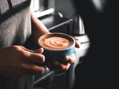 https://www.vecteezy.com/photo/1259393-person-holding-cup-of-coffee