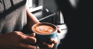 https://www.vecteezy.com/photo/1259393-person-holding-cup-of-coffee