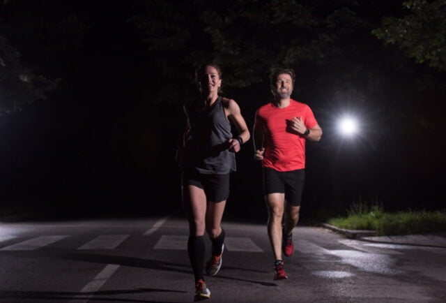 group of healthy people jogging in city park, runners team at night training https://www.vecteezy.com/photo/10980487-runners-team-on-the-night-training