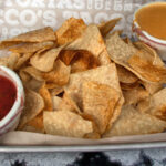 Totopos with salsa and queso dip