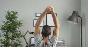 https://www.freepik.com/free-photo/back-view-man-desk-stretching-while-working-from-home_11785937.htm#query=desk%20stretch&position=1&from_view=search&track=sph