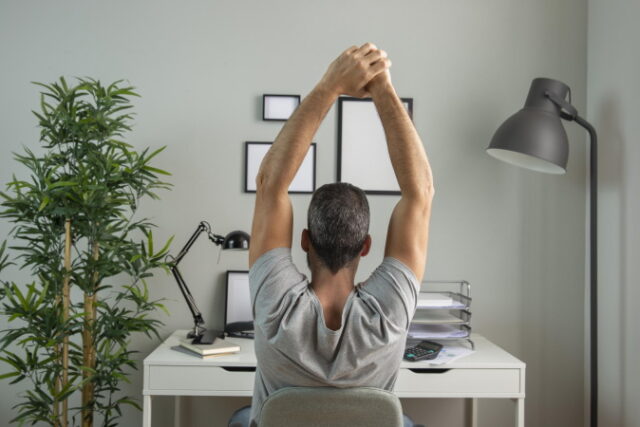 https://www.freepik.com/free-photo/back-view-man-desk-stretching-while-working-from-home_11785937.htm#query=desk%20stretch&position=1&from_view=search&track=sph