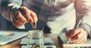 https://www.freepik.com/premium-photo/businesswoman-holding-coins-putting-glass_5312993.htm#query=savings&position=40&from_view=search&track=sph
